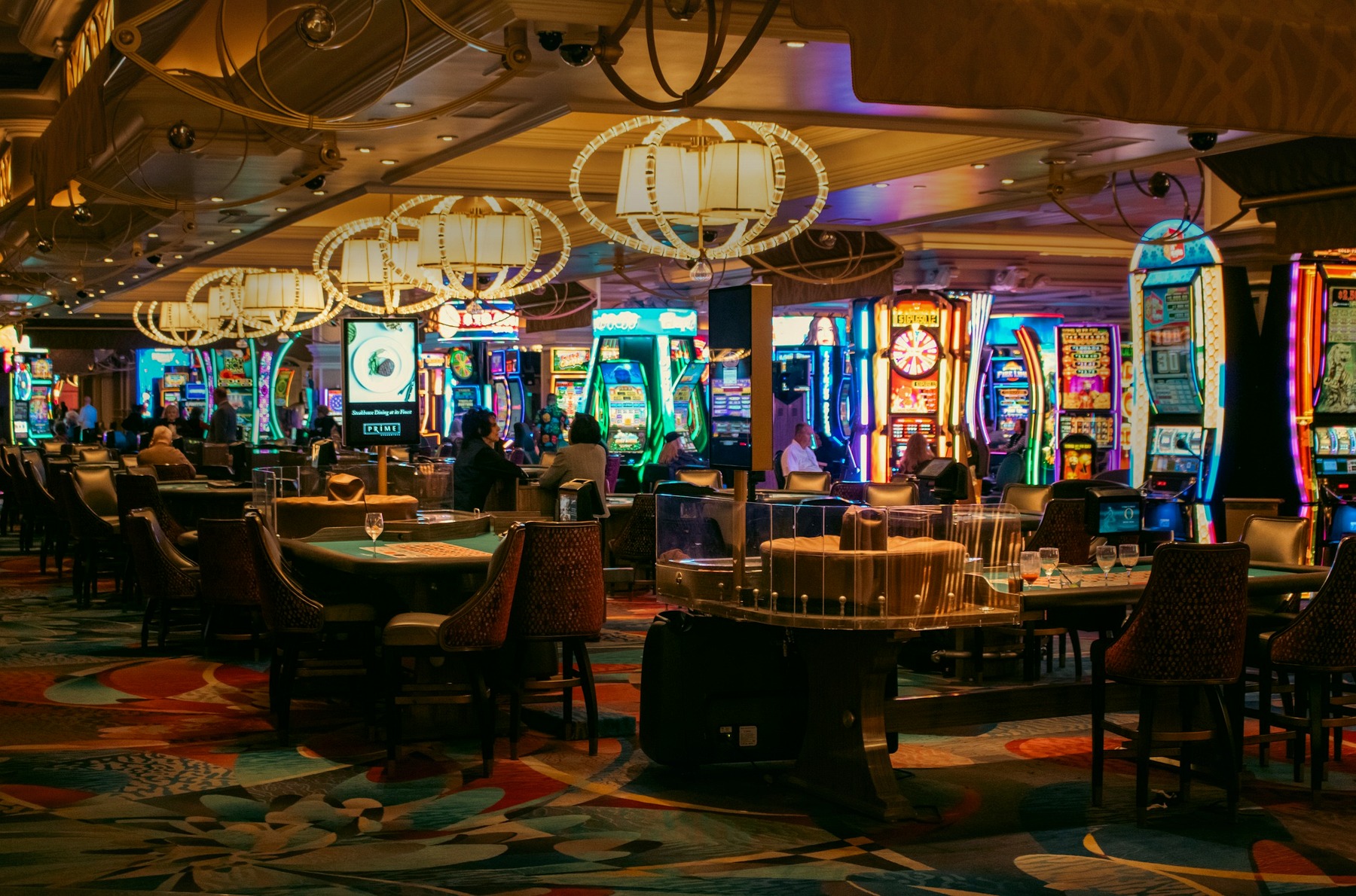 Photorealistic Las Vegas casino gaming floor with slot machines and tables